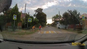 9RAW: Running child has near scrape with car