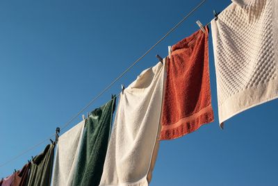 Not shaking towels before hanging to dry