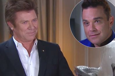 Nine Entertainment Editor Richard Wilkins reacts to Robbie William's question during a 2014 sit down interview.