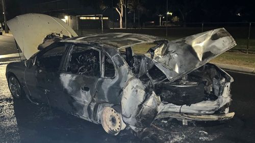 A Holden has been destroyed after it caught on fire in Adelaide. 