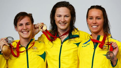 Gold medallist Cate Campbell (centre) with her sister Bronte Campbell, on the podium with fellow Aussie and bronze medallist Emma McKeon following their victory in the women's 100m freestyle final. (Getty Images)