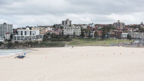 A deserted Bondi Beach is a strange sight on a sunny day.