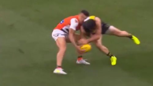 Cotchin hit Shiel high while contesting a loose ball on the wing. 