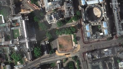 This satellite image provided by Maxar Technologies shows an overview of people gathered for the funeral procession of Queen Elizabeth II in London, Monday, Sept. 19, 2022. (Satellite image ©2022 Maxar Technologies via AP)