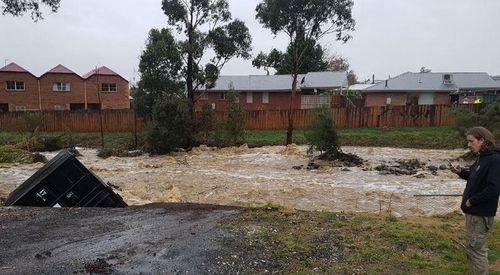 Flood waters damaged homes, businesses and washed cars away. 