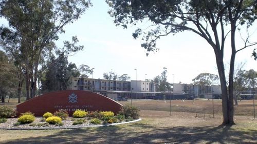 Photo of Swartz Barracks welcome sign and buildings at Army Aviation Centre Oakey in Oakey, Queensland, Australia. (Wikipedia)
