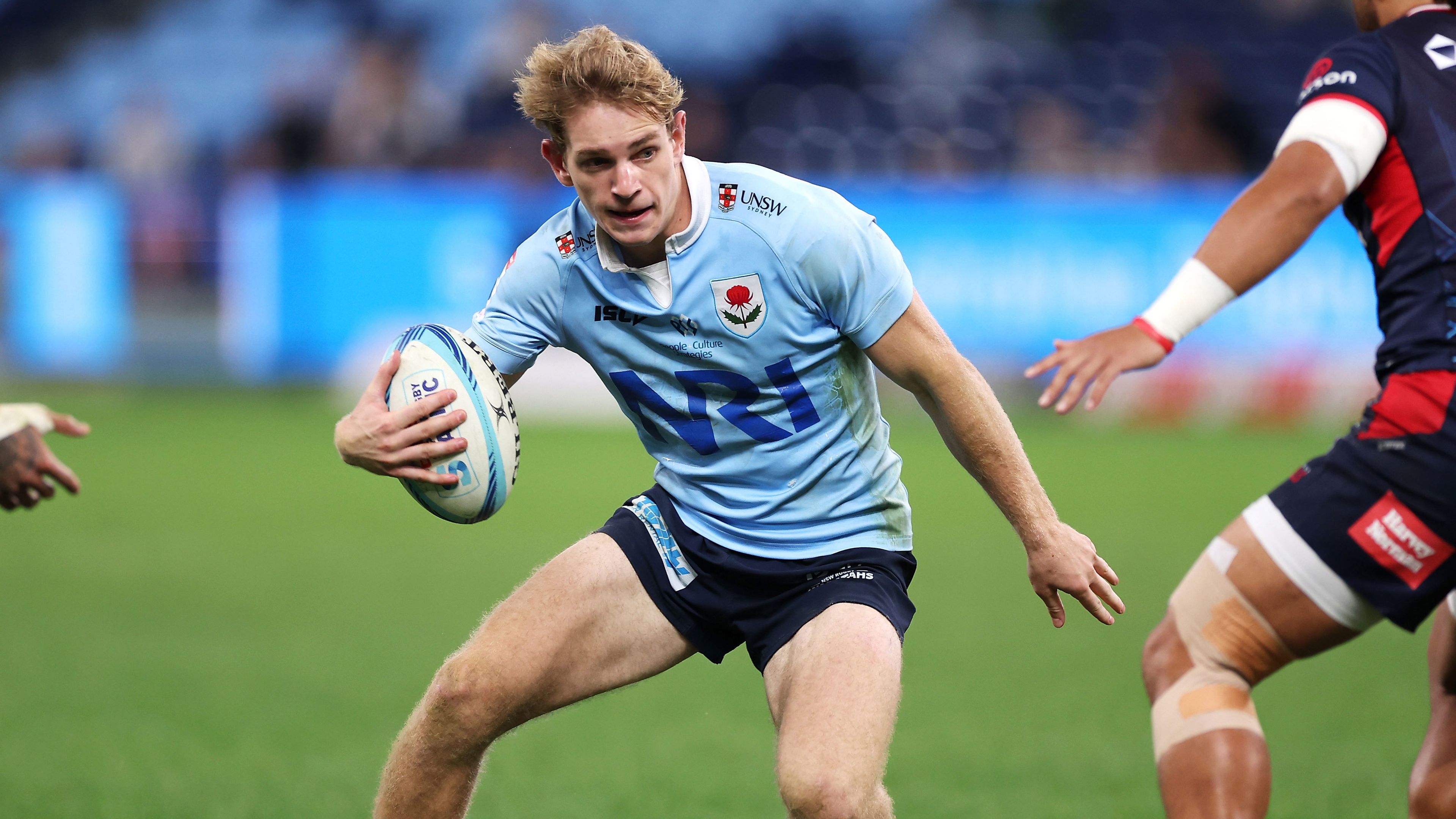 Max Jorgensen of the Waratahs runs the ball during the round 12 Super Rugby Pacific match between NSW Waratahs and Melbourne Rebels. 