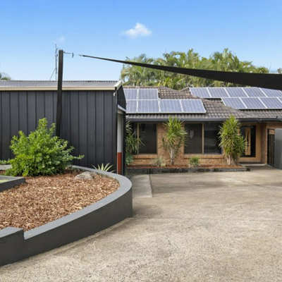 Gold Coast home's show-stopping kitchen features a tropical aquarium built into the island bench