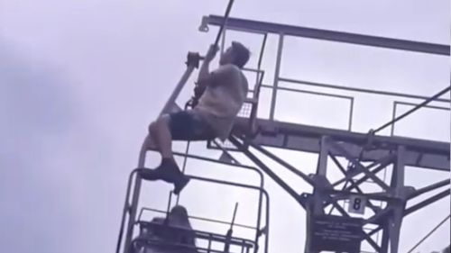 The teen was filmed performing pull-ups before he fell to the ground. 