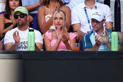 Morgan Riddle, girlfriend of Taylor Fritz of the United States looks on during the quarterfinal singles match between Novak Djokovic of Serbia and Taylor Fritz of the United States during the 2024 Australian Open at Melbourne Park on January 23, 2024 in Melbourne, Australia. (Photo by Cameron Spencer/Getty Images)