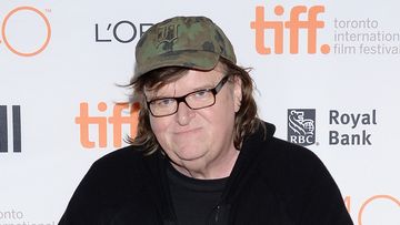 Michael Moore has opened up his apartment to Syrian refugees and has set up a website allowing others to offer up their homes as well. (AAP)
