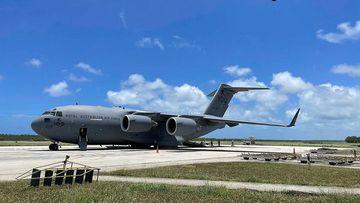 A Royal Australian Air Force C-17A Globemaster III aircraft delivers the first load of Australian Aid to Tonga&#x27;s Fua&#x27;Amoto international airport on 20 January 2022.
