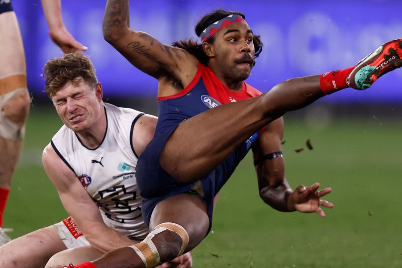 Kysaiah Pickett of the Demons kicks a goal to win the game during the round 22 AFL match between the Melbourne Demons and the Carlton Blues at Melbourne Cricket Ground on August 13, 2022 in Melbourne, Australia. (Photo by Darrian Traynor/Getty Images)