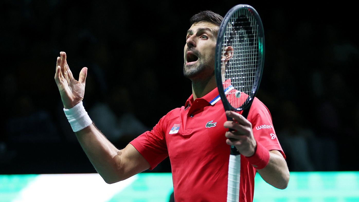Novak Djokovic of Serbia reacts during the Semi-Final match against Jannik Sinner of Italy in the Davis Cup Final at Palacio de Deportes Jose Maria Martin Carpena on November 25, 2023 in Malaga, Spain. (Photo by Clive Brunskill/Getty Images for ITF)