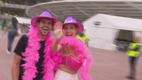 Harry Styles fan arrive at Sydney Olympic Park ahead of the concert.