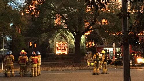 Firefighters attempt to put out the blaze. (Mark McEwan)