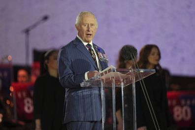 King Charles III speaks on stage during a concert to mark the 80th Anniversary of VE Day at Horse Guards Parade on May 8, 2025 in London, England. 