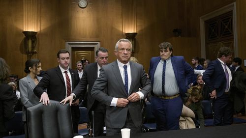 Robert F. Kennedy Jr., the controversial environmental lawyer turned public health critic, cleared his first hurdle on Tuesday (Wednesday AEST) to become the USA's top health official when the Senate finance committee voted to advance his nomination for a floor vote.