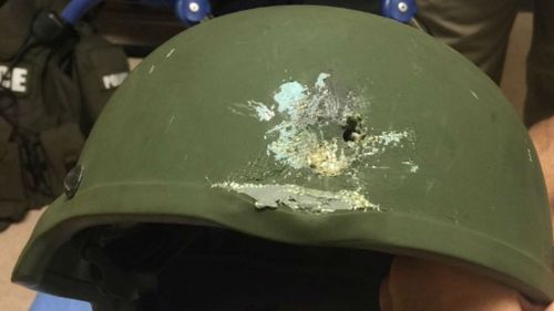 Orlando shooting: Police officer’s life saved by helmet during shootout