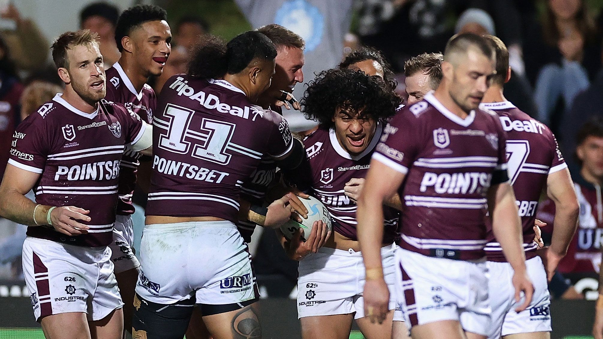 Christian Tuipulotu celebrates scoring a try during the round 16 NRL match between Manly and the Storm.
