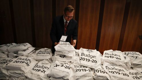 The budget papers are stacked in bundles for journalists ahead of the budget lock-up.