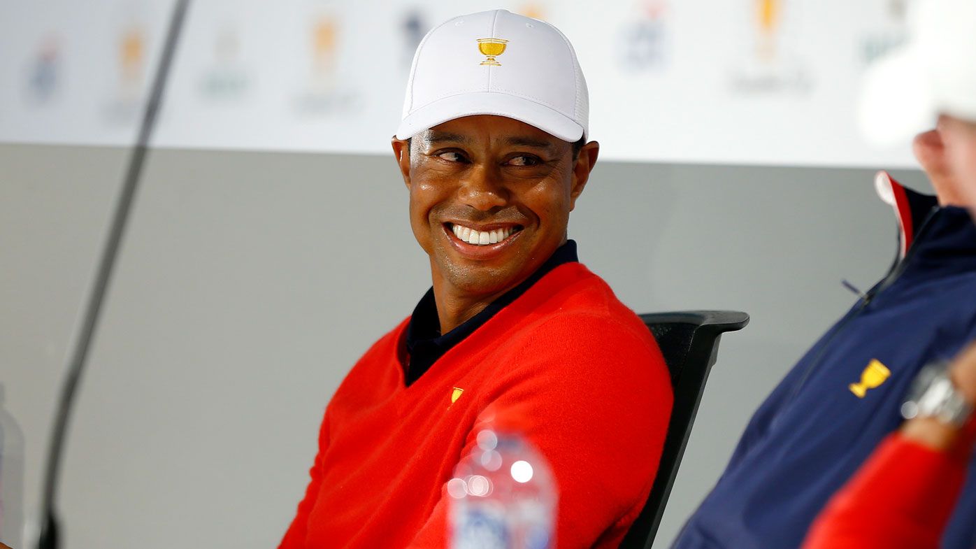 Playing Captain Tiger Woods of the United States team speaks ot his assistant captains while taking part in picking Thursday&#x27;s Four-Ball Pairings 