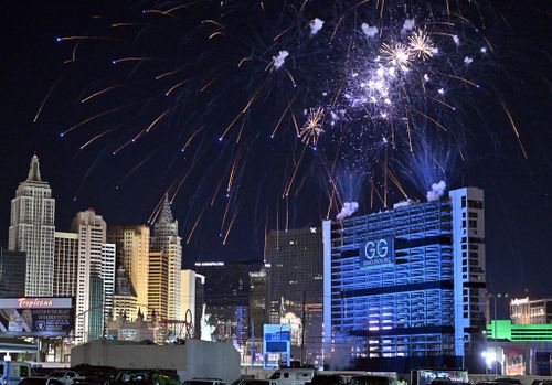 Fireworks are launched before the Tropicana Las Vegas towers are imploded
