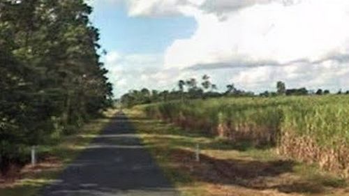 Woman found with throat cut at property in north Queensland
