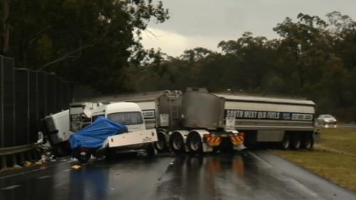 Man and woman killed in van and semi-trailer crash on Warrego Highway at Ipswich