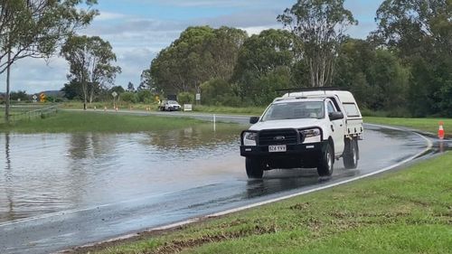 At Beaudesert, west of the Gold Coast, the racecourse and access roads are still submerged. 