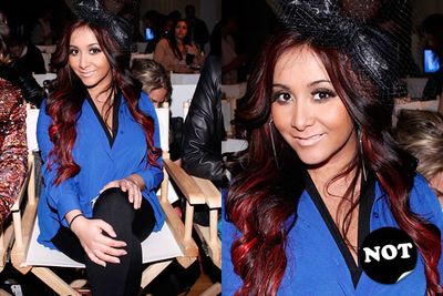You'd think being Fashion Week and all, Snooki would have made a special effort to hold off on the orange tinge. Apparently not.