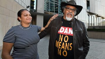Murrawah Johnson (left) and Adrian Burragubba (right) from the Wangan and Jagalingou traditional owners group are seen outside the Federal Court in Brisbane.