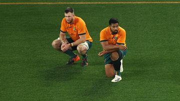 The Wallabies are dejected in defeat.