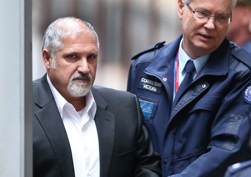 Fernando Paulino is taken from a prison van into the Supreme Court, Melbourne, Tuesday, June 13. (AAP)