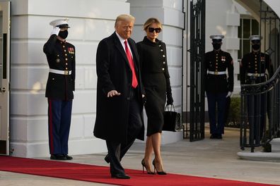 President Donald Trump and first lady Melania Trump depart the White House to board Marine One, Wednesday, Jan. 20, 2021, (AP Photo/Alex Brandon)