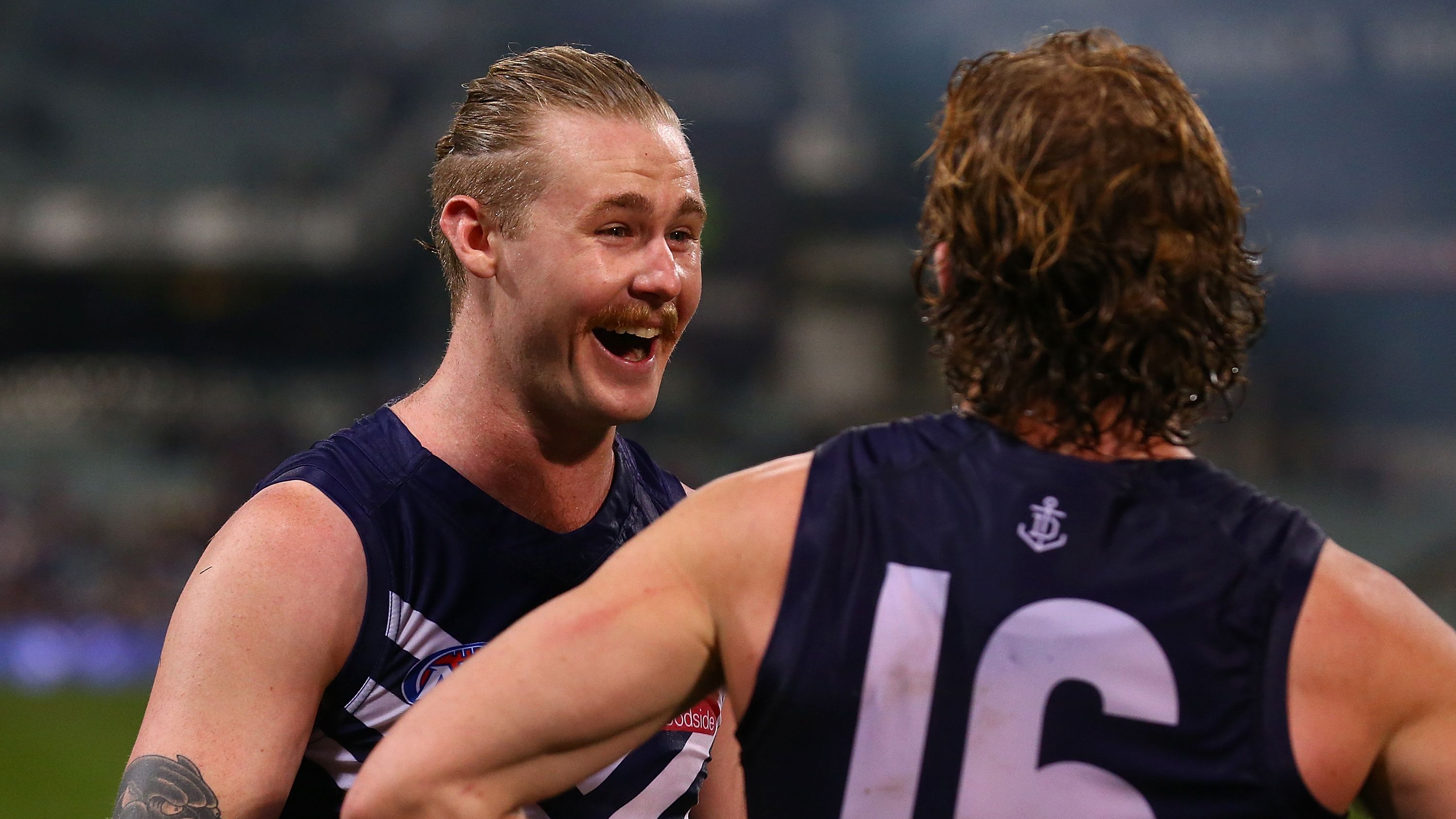 Cam McCarthy of the Dockers shares a moment with David Mundy after winning the round 20 AFL match between the Fremantle Dockers and the Gold Coast Suns at Domain Stadium on August 5, 2017 in Perth, Australia. (Photo by Paul Kane/Getty Images)