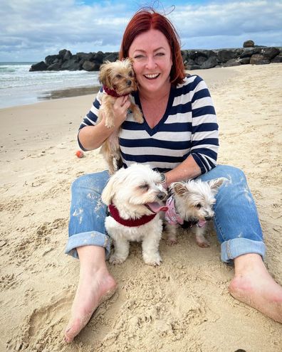 Shelly Horton with her three dogs, including Bella on the right.