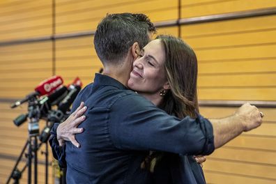 New Zealand Prime Minister Jacinda Ardern and fiance Clark Gayford after announcing her resignation at a press conference in Napier, New Zealand.
