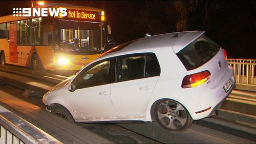 The Volkswagon Golf became wedged in the tracks under the Darley Road bridge just after 4am.