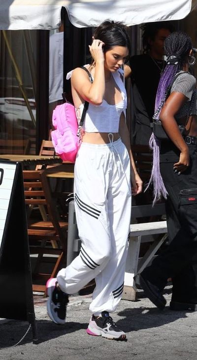 Kendall Jenner has debuted a sporty take on the Kardashian&rsquo;s
favourite tightly-wound garment, <a href="https://style.nine.com.au/2016/03/03/08/57/breathe-in-like-gigi-for-the-corset-trend" target="_parent" title="the corset." draggable="false">the corset.</a><br />
<br />
Yesterday, <a href="https://style.nine.com.au/2017/11/22/09/25/forbes-highest-paid-models-kendall-gisele-2017" target="_blank" title="the world’s highest paid model" draggable="false">the world&rsquo;s highest paid model</a> stepped out in Los
Angeles in a white, fitted corset top from influential style blogger
Rumineely&rsquo;s fashion line, <a href="https://www.areyouami.com" target="_blank" title="Are You Am I." draggable="false">Are You Am I.</a><br />
<br />
Jenner complemented the look with a pair of Adidas by
Danielle Cathari track pants and sneakers, proving that not all corsets have to
be worn inside a castle or on a red carpet.<br />
<br />
The trick is not to think of the corset as an outdated
lingerie staple, but rather as a fetish-forward way to enliven dull daywear. <br />
<br />
Dip
your toe into this coveted trend with some of our favourite corset pieces.
Click through to find one that is right for you.