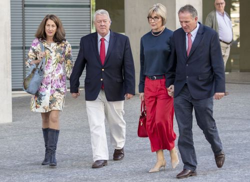 Liz, John, Helen and Joe Wagner leaving court today. The family has accused radio shockjock Alan Jones of blaming them for the deaths of 12 people in the Queensland floods. Picture: AAP