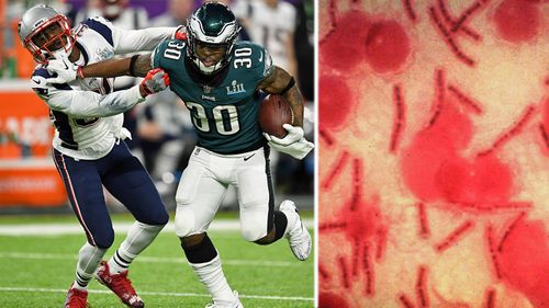 A microscopic view of stained anthrax bacteria and the Super Bowl  action, in Minneapolis. (Photos: AP).