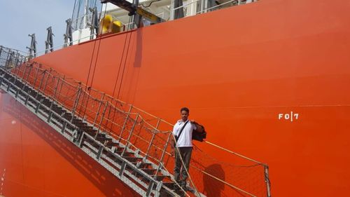 The Indonesian consul general office in Osaka took this photo of Mr Aldi leaving his rescue ship when it landed him in Japan.