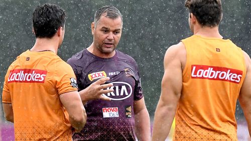  Coach Anthony Seibold talks tactics with his players during a Brisbane Broncos NRL training session