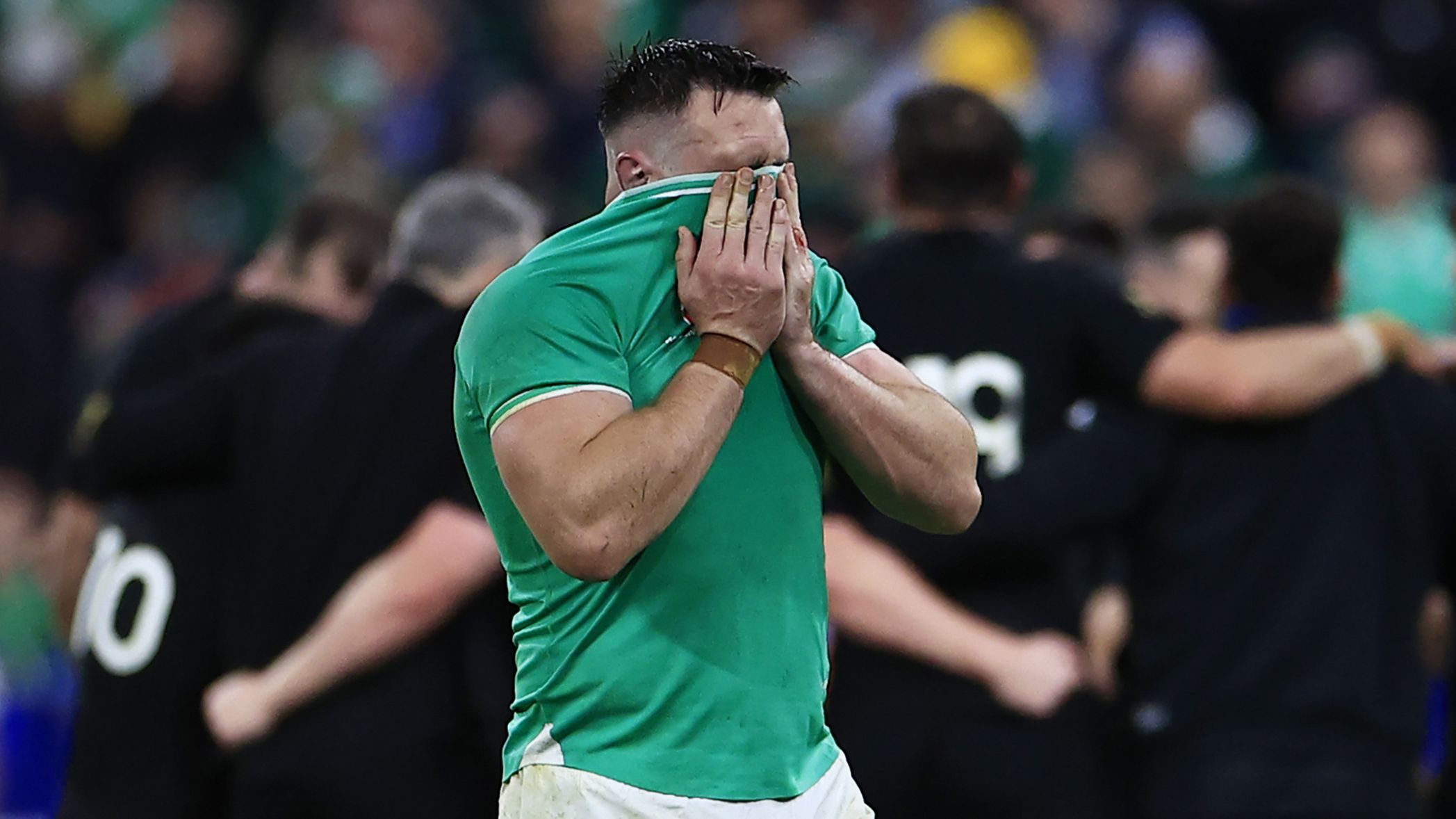 Ireland&#x27;s Jack Conan covers his face after losing to New Zealand in the quarter-final.