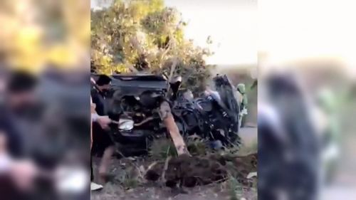 The Mazda RX-7 was almost unrecognisable after the high-speed crash. (9NEWS)