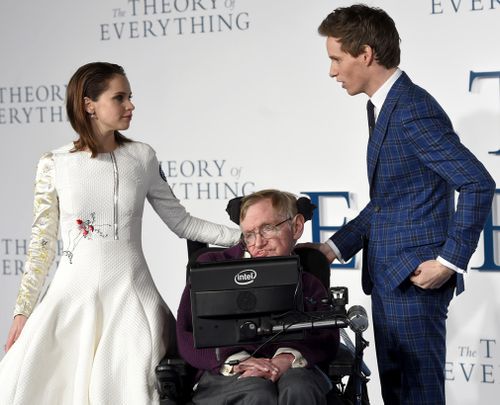 'The Theory of Everything' stars Felicity Jones and Eddie Redmayne with Hawking in 2014. (AAP)