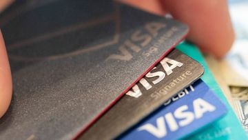 FILE - This Aug. 11, 2019 file photo shows Visa credit cards in New Orleans. On Wednesday, Jan. 8, 2020, the Federal Reserve releases its August report on consumer borrowing for November. (AP Photo/Jenny Kane, File)