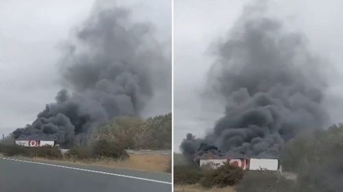 A Target truck on fire on a NSW Highway.