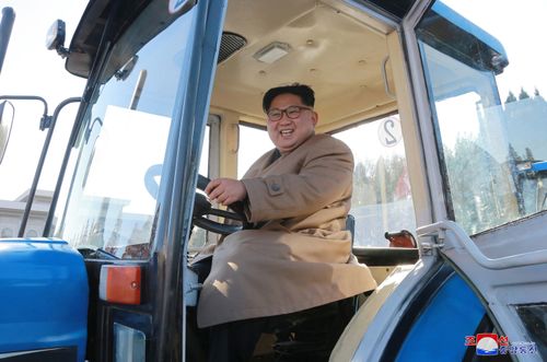 In this undated photo provided on Wednesday, Nov. 15, 2017, by the North Korean government, North Korean leader Kim Jong Un sits in a tractor at the Kumsong Tractor Factory, in Nampo, North Korea.